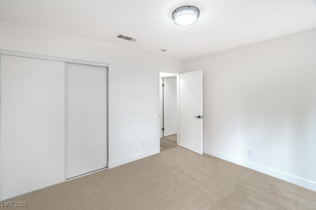 10009 Coral Sands Dr, Las Vegas, NV 89117 - unfurnished bedroom featuring baseboards, carpet, a closet, and visible vents