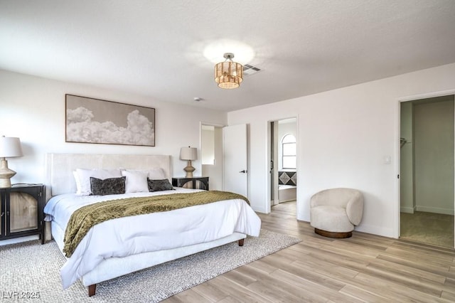 10009 Coral Sands Dr, Las Vegas, NV 89117 - bedroom featuring baseboards and wood finished floors