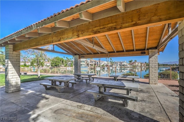 10009 Coral Sands Dr, Las Vegas, NV 89117 - view of patio featuring a water view and fence