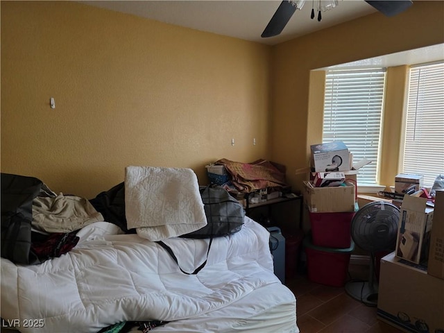 bedroom featuring ceiling fan