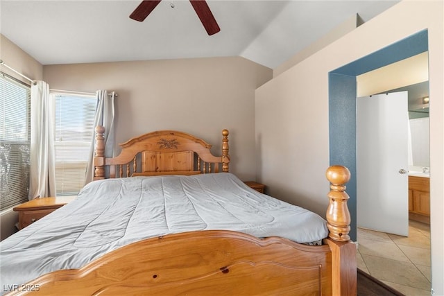 tiled bedroom featuring ceiling fan and lofted ceiling