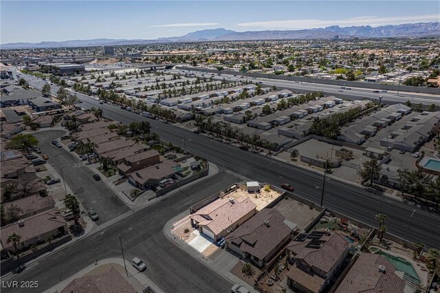 aerial view with a mountain view and a residential view
