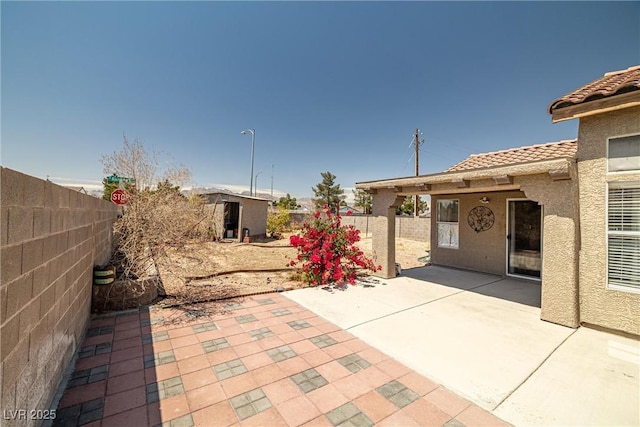 view of patio featuring a fenced backyard