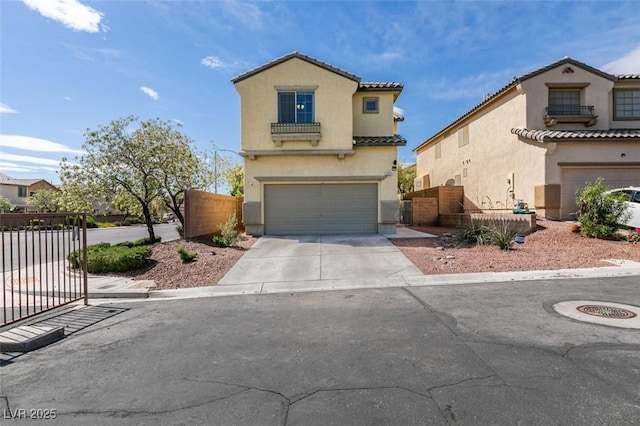2929 Salado Creek Ave, North Las Vegas, NV 89081 - mediterranean / spanish home featuring driveway, stucco siding, and an attached garage