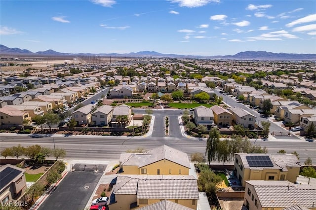 aerial view featuring a mountain view and a residential view