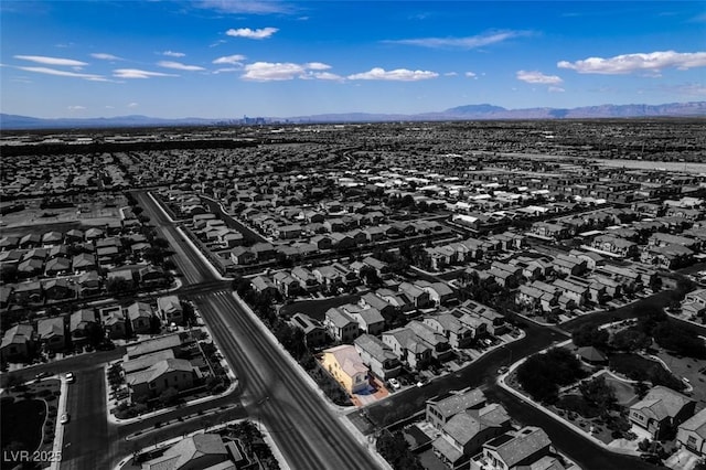 birds eye view of property featuring a residential view and a mountain view