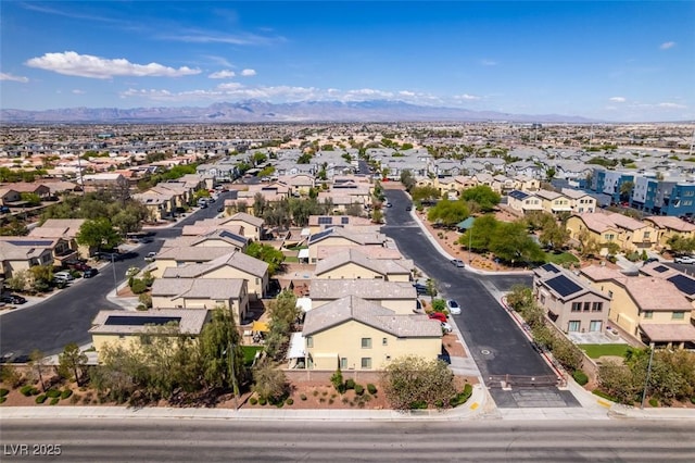 drone / aerial view with a mountain view and a residential view