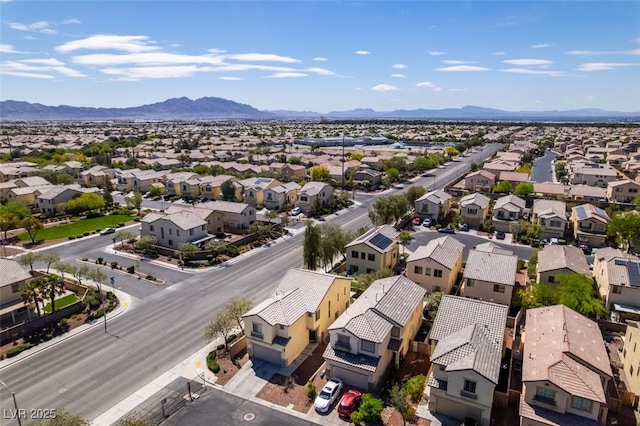 bird's eye view with a residential view and a mountain view