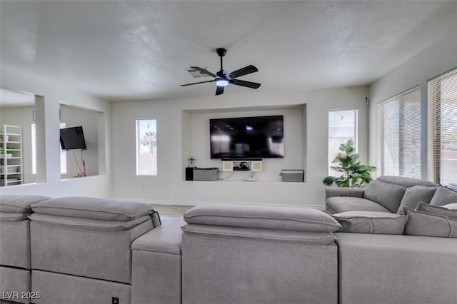 2929 Salado Creek Ave, North Las Vegas, NV 89081 - living room featuring ceiling fan, baseboards, and wood finished floors