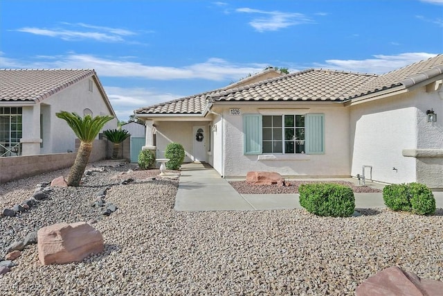 1326 Winter Solstice Ave, Henderson, NV 89014 - view of front of home featuring a tile roof and stucco siding