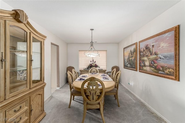 1066 Aspen Valley Ave, Las Vegas, NV 89123 - dining space with baseboards and light carpet