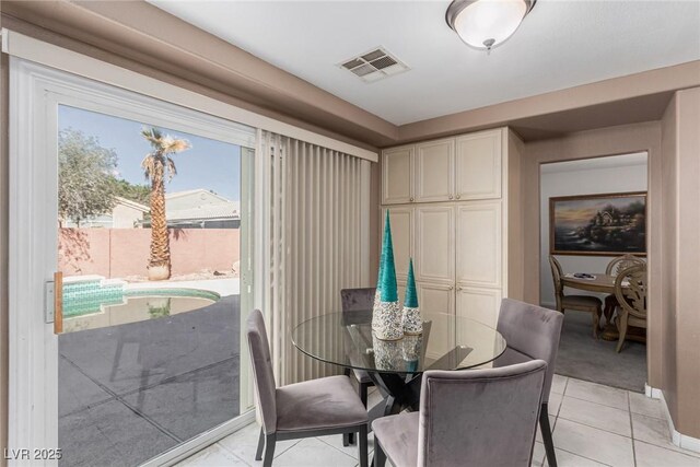 1066 Aspen Valley Ave, Las Vegas, NV 89123 - dining space featuring light tile patterned floors and visible vents