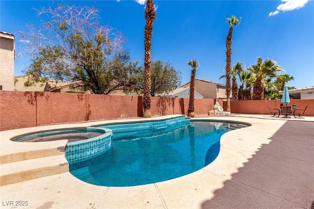 1066 Aspen Valley Ave, Las Vegas, NV 89123 - view of swimming pool with a fenced backyard, a patio, and a pool with connected hot tub