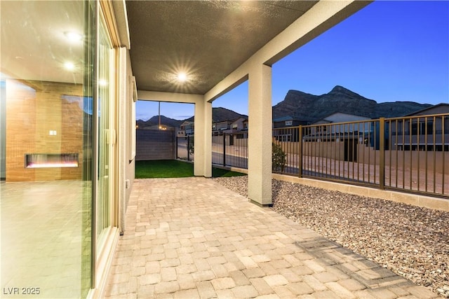 view of patio / terrace featuring a residential view and a fenced backyard