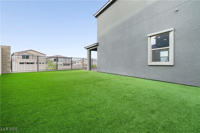view of yard with fence