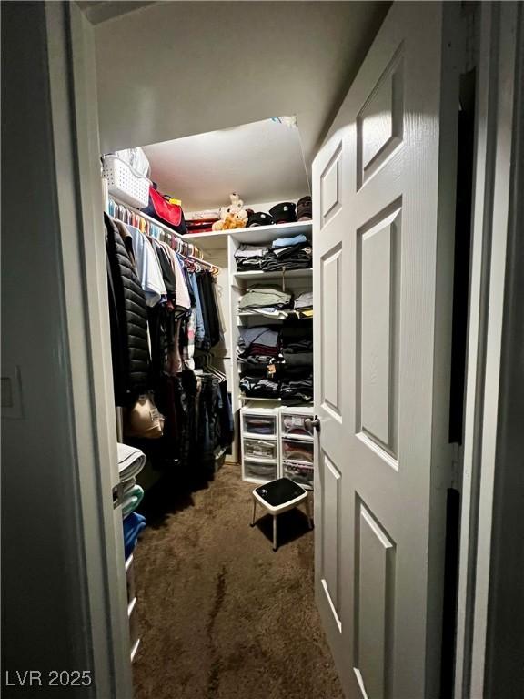 1440 Vegas Valley Dr Unit 2, Las Vegas, NV 89169 - walk in closet featuring carpet flooring