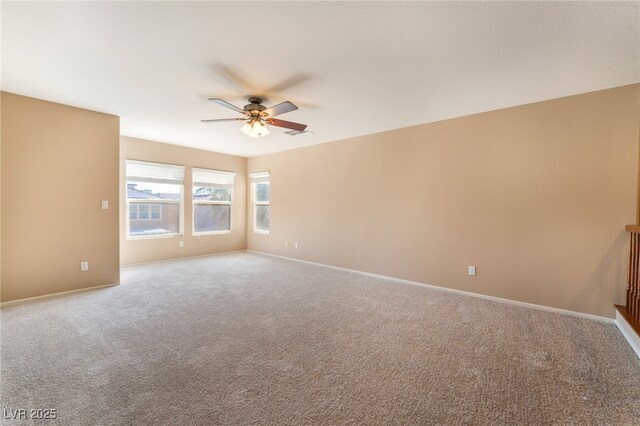 7098 Seabirds Pl, North Las Vegas, NV 89084 - unfurnished room featuring a ceiling fan and carpet