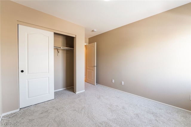 7098 Seabirds Pl, North Las Vegas, NV 89084 - unfurnished bedroom with carpet floors, baseboards, and a closet