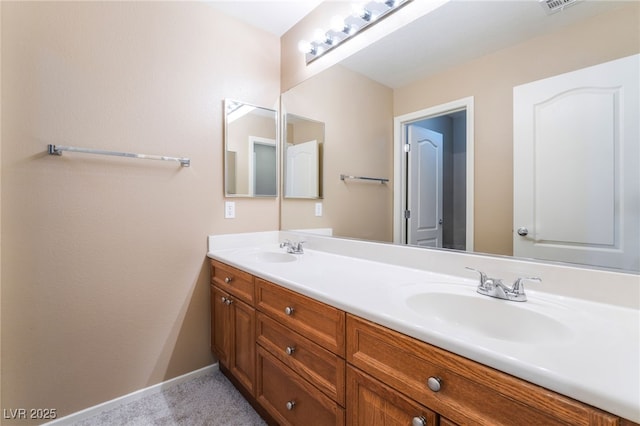 bathroom with double vanity and a sink