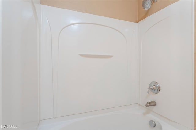 full bath featuring tub / shower combination