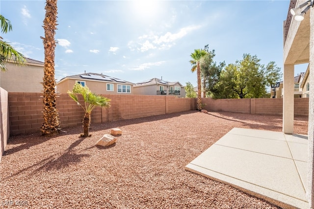 7098 Seabirds Pl, North Las Vegas, NV 89084 - fenced backyard with a patio