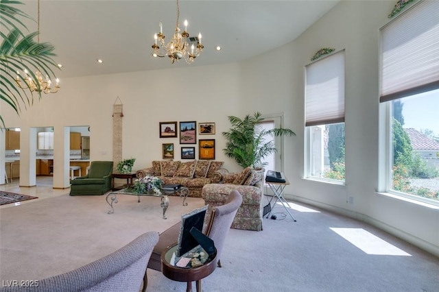 interior space with an inviting chandelier, carpet flooring, and recessed lighting