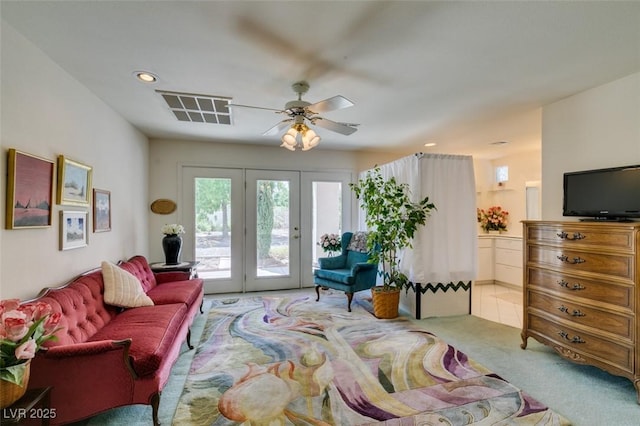 living room with visible vents, carpet floors, recessed lighting, french doors, and a ceiling fan