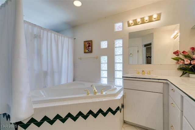 full bathroom with vanity, tile patterned floors, a bath, and a shower