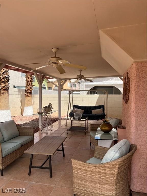 view of patio / terrace featuring a ceiling fan, an outdoor hangout area, and a fenced backyard