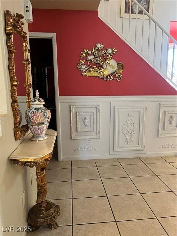 foyer with light tile patterned flooring