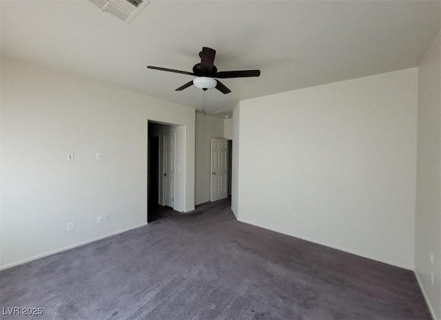 4645 Fuchsia Nights Ave Unit 103, North Las Vegas, NV 89084 - unfurnished bedroom featuring dark carpet and a ceiling fan