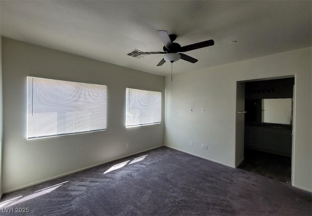 4645 Fuchsia Nights Ave Unit 103, North Las Vegas, NV 89084 - unfurnished bedroom featuring carpet, baseboards, and ceiling fan