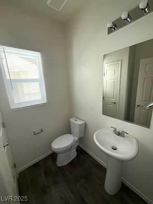 4645 Fuchsia Nights Ave Unit 103, North Las Vegas, NV 89084 - bathroom featuring toilet and wood finished floors