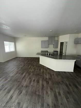 4645 Fuchsia Nights Ave Unit 103, North Las Vegas, NV 89084 - living area with dark wood-type flooring