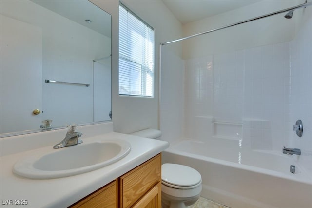 full bath featuring vanity, toilet, and shower / tub combination