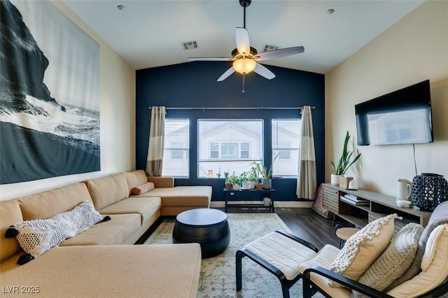 6576 Buster Brown Ave Unit 101, Las Vegas, NV 89122 - living area featuring lofted ceiling, dark wood finished floors, and a ceiling fan