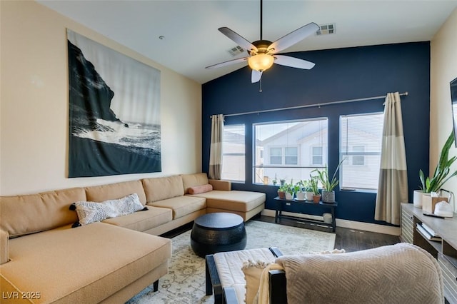 6576 Buster Brown Ave Unit 101, Las Vegas, NV 89122 - living area featuring wood finished floors, ceiling fan, lofted ceiling, and baseboards