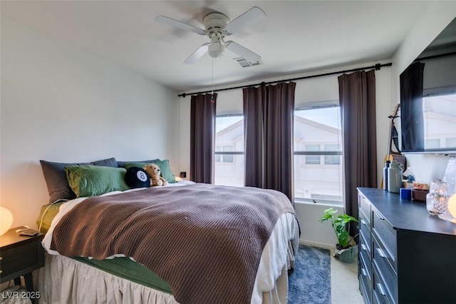 6576 Buster Brown Ave Unit 101, Las Vegas, NV 89122 - bedroom with light colored carpet and ceiling fan