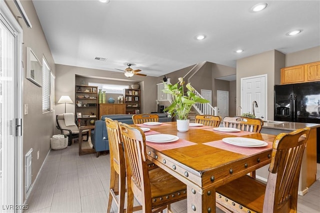 dining room with a ceiling fan, baseboards, and recessed lighting