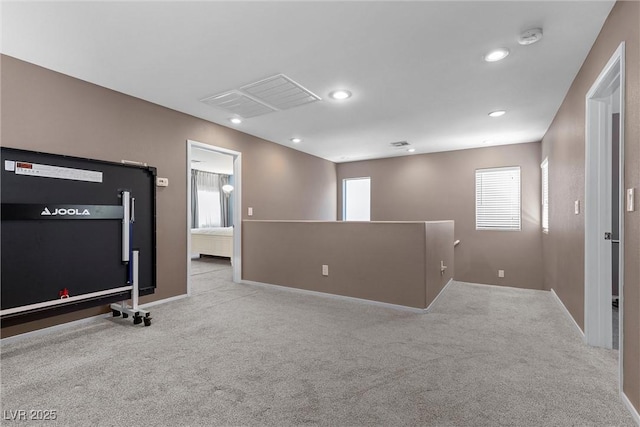 workout area featuring carpet floors, recessed lighting, and baseboards