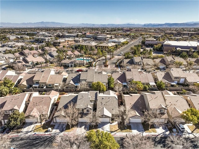 10205 Birch Bluff Ln, Las Vegas, NV 89145 - aerial perspective of suburban area featuring a mountainous background