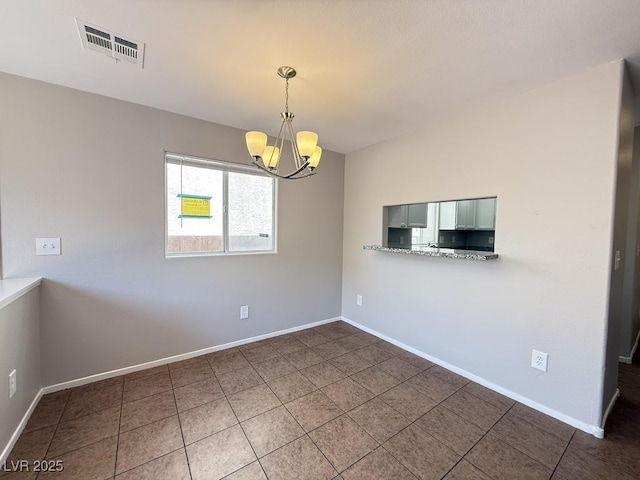 2105 William Holden Ct, Las Vegas, NV 89142 - unfurnished dining area with baseboards, tile patterned floors, a chandelier, and visible vents