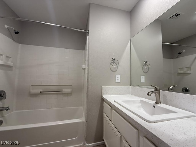 2105 William Holden Ct, Las Vegas, NV 89142 - bathroom featuring vanity, tub / shower combination, and visible vents