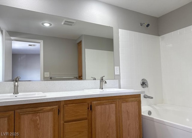 2105 William Holden Ct, Las Vegas, NV 89142 - full bath with double vanity, visible vents, and a sink