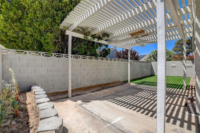 view of patio with a fenced backyard and a pergola
