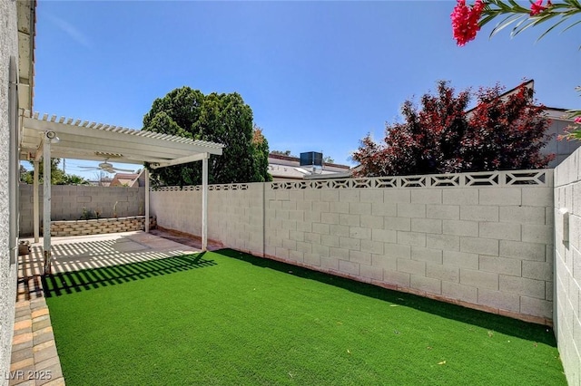 view of yard featuring a patio, a fenced backyard, and a pergola