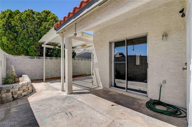 view of patio featuring a pergola and a fenced backyard
