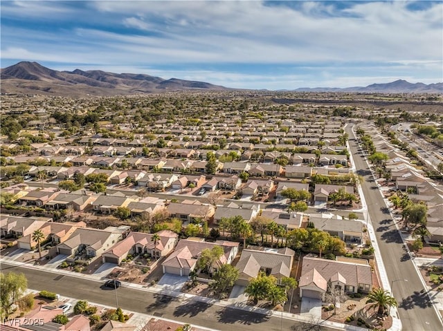 drone / aerial view featuring a mountain view and a residential view