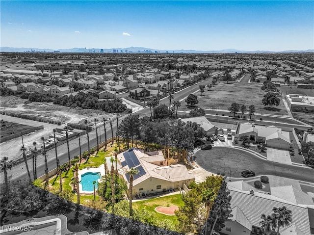 bird's eye view with a residential view and a mountain view