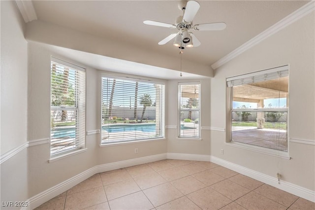 unfurnished dining area featuring baseboards, light tile patterned flooring, and a healthy amount of sunlight